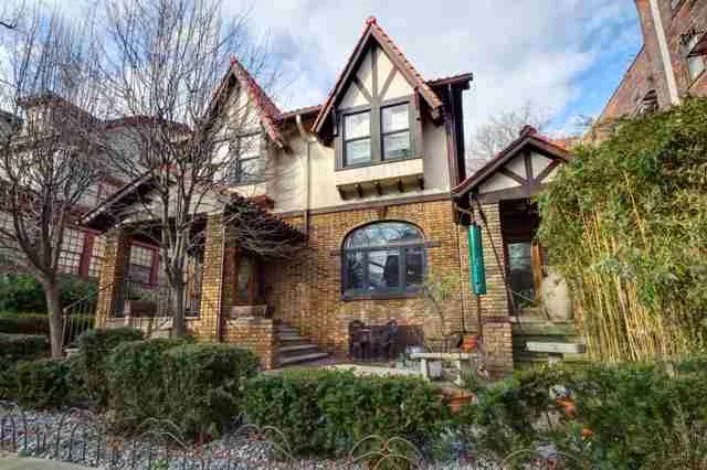 One of a kind stately Tudor right off of beautiful Blvd East with breathtaking views of the city from your front porch! Rare find with gorgeous hardwood floors throughout, spacious rooms and updated kitchen and baths with spa retreat in completely finished basement. Escape to your very own private backyard with serene and tranquil design. Adaptable to 2F style with 2 separate entrances. Quick commute to NYC, light rail, parks and shops.