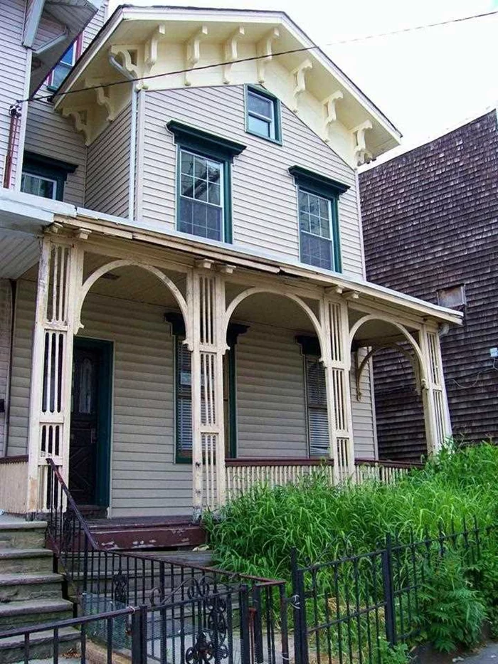 This great mid-19th Century Victorian house has good details, marble fireplaces, wide board flrs, early newel post, staircase with ribbon molding, original clg medallions, original door/window frames, basebds, and crown mouldings. It is a handyman AS IS sale . ready for a new Owner to finish the interior, add new bathrooms and new kitchen...finish the electrical work and add a new heating system..There are some new roofs, siding and windows. This house can, possibly, be converted to a 2 or 3 family.