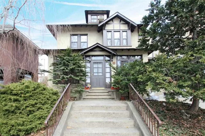 Built in 1913 & has original quality & detailing throughout. There are 5 bdrs, 2 full bths, 2 1/2 bths, & 4 levels in this 2, 634 sqft home - top 2 flrs have Central A/C. Each floor is concrete to muffle noise and parquet w/ mahogany inlays. The wood detailing, original stained glass windows, tall ceilings, fireplace & generous room sizes combine to make a wonderful ambience. Add'tl features include: 300 sq/ft walk in closet, walk-in cedar closet, small wine cellar, laundry room, and finished basement.