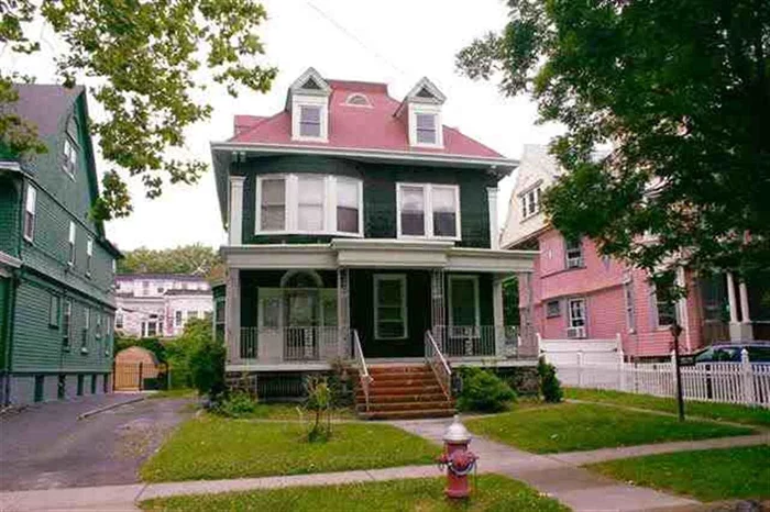 Step back in time with this Bentley Ave Victorian home on doctor's row. This home abounds with history and charm. Featuring original details includes stain glass windows, two fireplaces, hard wood floors with mahogany inlay and original wainscoting. Steps away from Lincoln Park, short distance to Charter School and transportation at your door.