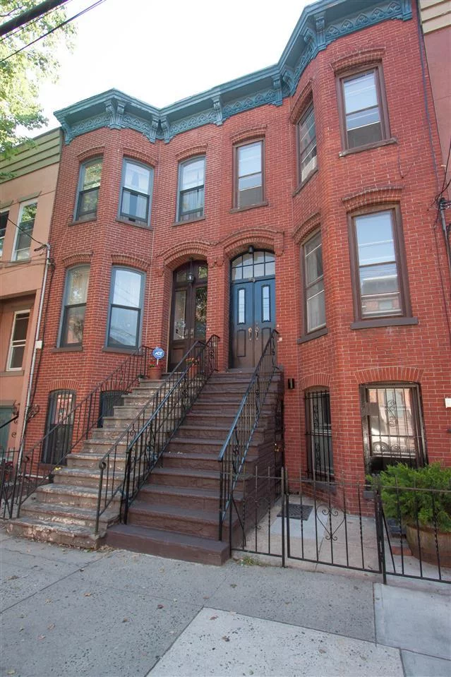 Victorian home, three floors of glorious living a few blocks from Van Vorst Park. 3br 1.5Ba with private yard. Lots of original details, H/W floors, formal dining room, wood burning fireplace. Walk to path... A MUST SEE!!!