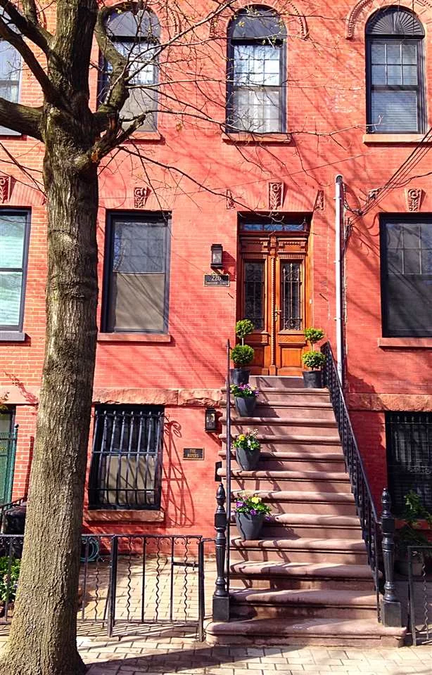 Welcome to this elegant single family brick row house in desirable uptown location outside of the flood zone. This gorgeous 3BD, 2BA offers exposed brick, 2-zone central A/C & heat, original mantle with mosaic tile, balcony off master BR. This must see kitchen has been redesigned w/all new Bosch SS appliances & open island. The garden level can also be used as a family/dining rm. w/direct access to your cozy yard. Plenty of storage in basement. Prkg 2 blocks away, minutes to Ferry, buses & Lincoln tunnel.