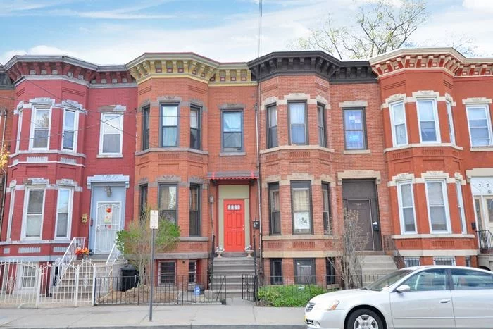 Beautifully Restored One Family Brownstone Featuring High Ceilings with Crown Moldings, 3 Bedrooms 2 Baths with Finished Basement. Hardwood Flooring thru-out, Nice Size Private Yard, Separate Dining room. A Must See Beauty! Journal Square less than 2 Miles away. Low Taxes