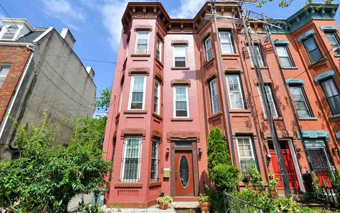 RARE OPPORTUNITY. This stunning fully renovated single family brownstone row house is located in the Sgt. Anthony Park Neighborhood of Journal Square. Features include 3 stories of livable space, 3 bed/2 bath with bonus in-law suite on the ground level. High ceilings, original crown molding, some original doors and some restored flooring is complemented by modern amenities. A modern kitchen boasts a stainless steel appliance package, updated bathrooms and separate laundry room. A 2nd floor porch leading from the kitchen into the fully landscaped backyard is ideal for entertaining and perfect for enjoying the outdoors in the privacy of your own home. Meticulously maintained this house truly embodies the pride in ownership and is a must see. Convenient to all public transportation, JSQ PATH is just a short distance walk with buses and shuttles at your door step.