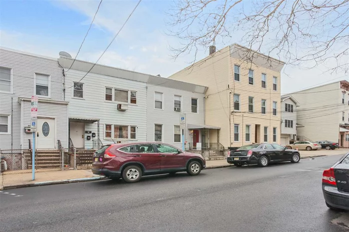 Rare single family row house located in Riverview Arts District of Jersey City Heights. Updated kitchen with stainless steel appliances, chestnut cabinetry and granite countertops. Lovely decorative fireplace in the living room, original details throughout. Large trex deck leading out to a deep private backyard. Finished basement with a 1/2 bath perfect for extra living space. Second level features three bedrooms, large walk-in closet and newer designer marble bath. All this located near parks, schools, light rail, bus to NYC and shopping.