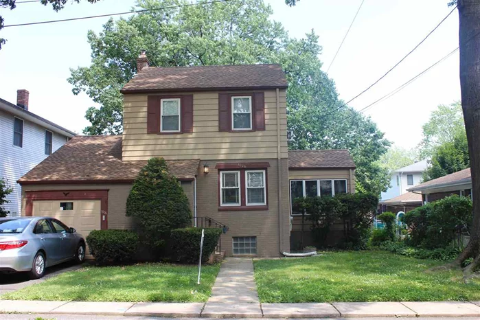 Classic colonial home with 2 bedroom and 1.5 bath with one car attached garage. Featuring an entry foyer that leads to a warm and inviting living room and formal dining room. Spacious eat-in kitchen with access to large deck overlooking private yard; perfect for outdoor entertaining. Full/finished basement for extra living space. Close to school, NYC transportation, shops, restaurants, major highway, and minutes to George Washington Bridge. Located on a quiet tree lined street.