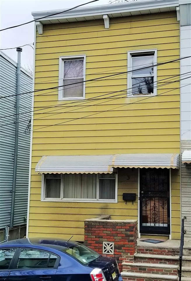 Charming single family home available on this quaint and secluded dead end street in the Lafayette section of Jersey City. This solid and original semi-attached (south facing) 2 story row house offers a separate living room, dining room, three bedrooms, 1.5 bathrooms and an unfinished basement. Many original details in this gem such as fireplace mantle, original hardwood floors and high ceilings. Terrific and spacious urban backyard ready for your customization and enjoyment!