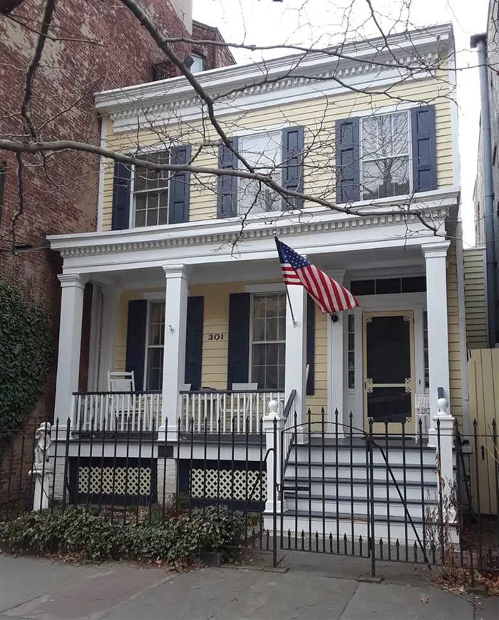 Rare opportunity to own a spectacular historic greek revival house on Grove St. in the Jersey City Downtown area. This house has a full walk out basement with laundry room, formal dining room, eat-in kitchen, 3 Bedrooms + dressing room/office, original wide plank pine wood floors, patio and lovely back yard. Steps to Grove St. Path. Near City Hall, Parks, restaurants, stores, schools and all amenities.