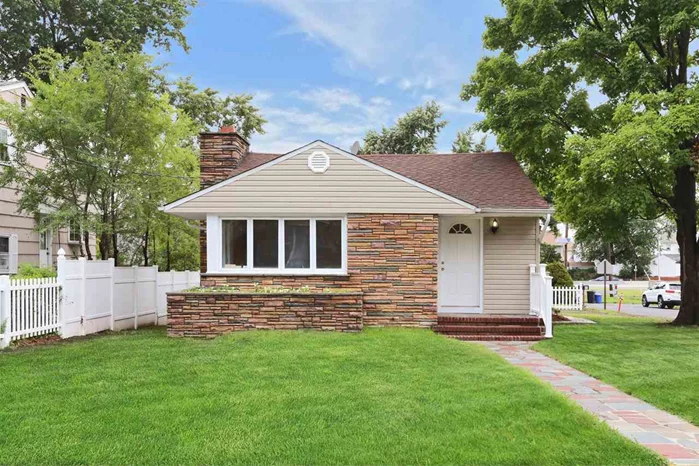 A true Must See! Brand-new beautifully renovated 3 bedroom home in Elmwood Park! This spacious, corner-lot home offers a well-manicured front, side & back yard; fenced in on 2 sides. Enter into the large living area, with a functioning fireplace & ample room for a separate dining area. The new kitchen features stainless steel appliances, generous cabinets and attractive tile backsplash. This lovely home also boasts central AC (brand-new HVAC system), recessed lighting, & hardwood flooring throughout. Additional elements include a full unfinished basement & private driveway. Don't wait! Come enjoy the summer evenings on your open porch! Close to schools, restaurants, shopping, & transportation.