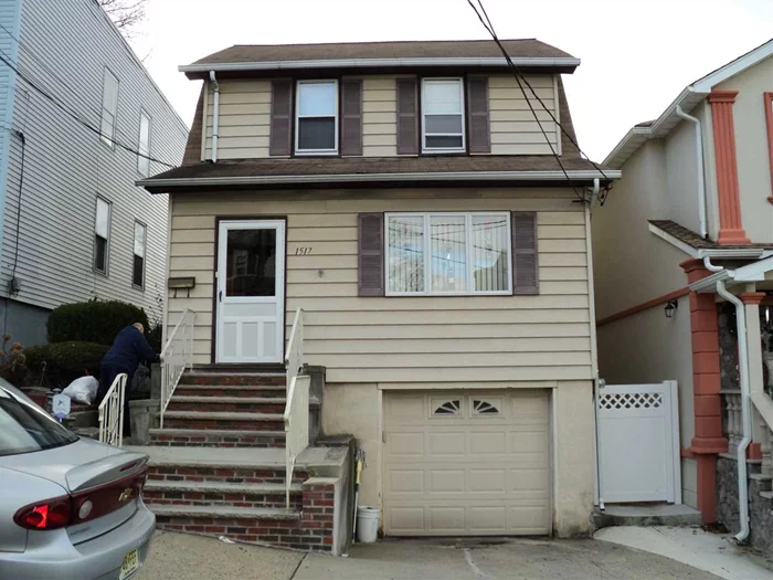 Fantastic 4 BR, 2 1/2 bath. Home in Upper North Bergen, large rooms, Modern Kitchen with Island counter. Formal living + dining room. Finished basement, huge backyard with paved patio. Garage + driveway and much more. Call today! Won't last!