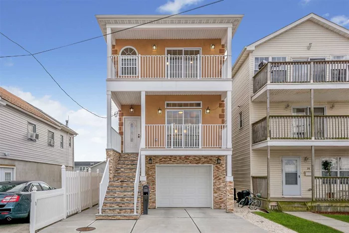 Welcome Home! This newly constructed three bedroom, two bathroom home is the Jersey Shore property you've been waiting for. Step into this home and be welcomed by the large kitchen & living room, great for entertaining. This property boasts three equally sized bedrooms with balconies that provide partial views of the ocean. Just when you think you've seen it all, don't forget to check out the yard & garage.