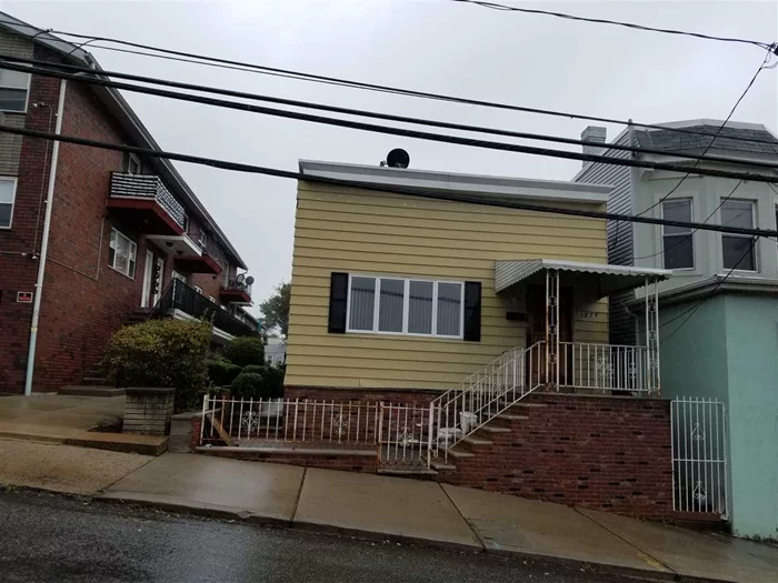Hurry!!! Spacious one family house, situated minutes away from North Bergen Recreation Center, Shopping and dining district such as: Wallmart, target, Home Depot, Lowes, Apple bees and so on. The House needs some work but it has lots of potencial It offers a full partial finish basement, wooden Deck, backyard, big eating kitchen, living room three bedrooms one bath, gas heating system etc. This home is Sold As Is condition. Therefore, It's price just right for the right starting family. It won't last...Call immediately.
