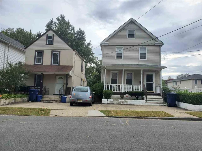 Redevelopment opportunity!! Two houses on 1 lot being sold as is. 68 x 110 lot (7, 480 sq ft). One house has 4 bedrooms / 1 bath, the other house has 2 bedroom / 1 bath. Being sold strictly as is. Near the corner of 1st St. Close to many new homes and duplexes. Shared driveway between both homes.