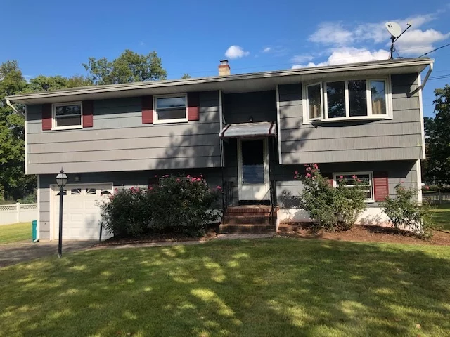 Great split level in Piscataway, NJ. This is a corner lot, very large yard, quiet neighborhood. Three bedrooms on top floor with one bedroom and office/den on bottom floor of a great split level. Needs a little TLC. Great property to entertain, either indoors or for those great outdoor get-togethers.