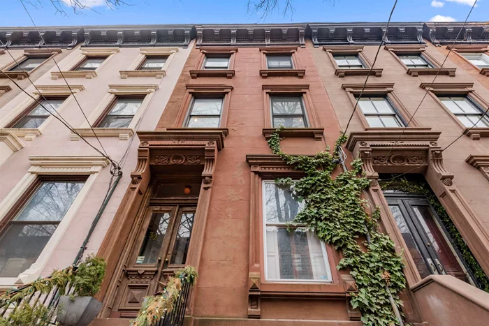 A classic brownstone located in historic Downtown Jersey City, just a half block from Van Vorst Park and six blocks from Grove St. PATH. This is a 4-story home constructed in the 1860s. There is abundant historic period detail, including a sweeping banister, marble mantels, plaster moldings and medallions, etched glass entry doors, stained glass transom, original interior window shutters, intricate parquet floors with mahogany inlay and lincrusta wall covering. This home boasts a full basement and is nestled on a 100-foot deep lot. The classic character of this home is juxtaposed with a modern, bright, south-facing extension on the lower 2 floors.