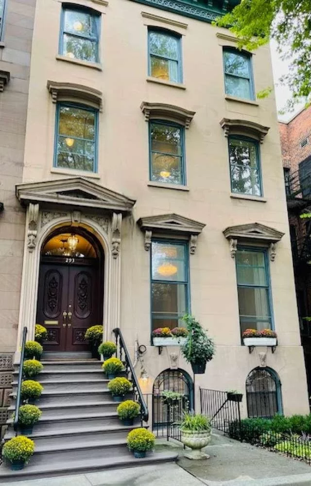 SIZE MATTERS!! (5, 098 sq. feet of living space) especially if you are directly in FRONT OF THE PARK. A truly extraordinary 25' wide Brownstone Townhouse on a 100' deep property, detached on 3 sides. This gem was built across from the center of Van Vorst Park, where the premier townhouses where built along this QUIET tree-lined street (where there are NO buses or two way traffic on this street). This neighborhood is one of Downtown's most culturally and architecturally interesting. It was completely renovated in 2004 and has just undergone an extensive restoration for the past ten (10) months, integrating both boundless elegance yet so easy to live in - the public gathering rooms of this home offer the space and comfort for both grand entertaining and quiet gatherings. The impressive parlor, with floor to ceiling windows consists of a formal and an informal living room, a formal dining room and a spacious eat-in kitchen that overlooks one of the most serine bluestone backyards in downtown. This four (4) story townhouse has five (5) bedrooms, four (4) full baths, four (4) fireplaces, four (4) skylights, along with front and rear gardens. The gracious bedroom floors include a third floor master suite that faces the green canopy of Van Vorst Park along with an abundance of closets. Additional luxuries of this remarkable brownstone includes a possible bonus 2 bedroom, 1 bath lower level apartment that could lease for approx. ($50, 000 annually) to entirely cover the annual taxes and insurance expense, or to host your guests, resident nanny or private home office and gym. 2 laundry rooms, audio/video wiring throughout, multi-zone heat and Central HVAC air conditioning system. Four (4) blocks from the Grove Street Path Station & Restaurant Row. Walking distance from The French American Academy & The Scandinavian School of JC. A townhouse of this size, in this location and condition rarely comes on the market. 293 York Street is one of this neighborhood's true treasures.