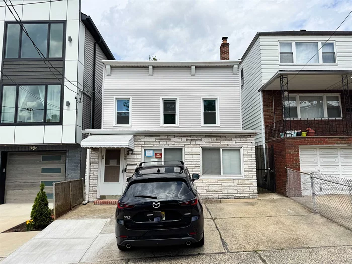 The possibilities are endless in this Jersey City Heights single family home. This golden opportunity has a 25x100 ft lot size and is strategically located only a few blocks from Journal Sqaure and the Path Station making it a true commuter's dream. The first floor features living room, kitchen, utility room, bathroom, and 2nd floor has two bedrooms and a full primary bath. There is parking for 2 cars in the convenient driveway and only minutes away from a great selection of JC's restaurants, parks, schools, shops, and more! Your next project awaits, come see it today!