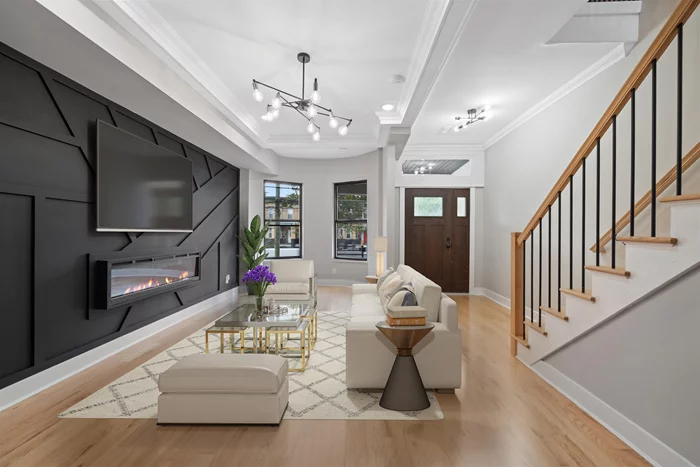 OH this Sat 09/28 @ 12-2pm and Sun 09/29 @ 1-3pm! The epitome of modern day luxury has finally hit the market in the ultra desirable Jersey City Heights! One of Jersey City's top builders brings you this jaw-dropping single family home, re-built from the ground up with the utmost of elegance and style. EVERYTHING is top of the line and brand new, including the water and sewer lines! Marvel as you walk in to the open layout living room and kitchen, with sleek Calcutta Quartz Countertops & white Shaker cabinets, accented with a beautiful herringbone backsplash and a Samsung luxury appliance package. The first level is personified with magnificently designed coffered ceilings and a meticulously handcrafted fireplace accent wall. Enjoy the convenience of a bedroom on the first floor, leading out to a beautifully manicured Backyard Oasis & access to your lower level fully finished basement, with a laundry room and an open layout. The first level also contains a full bathroom with exceptional tile work! The second level is beautifully laid out with an additional 3 MASSIVE bedrooms with large closets & another full bathroom. The conveniences of Kennedy Blvd and various forms of public transportation, make commuting to the PATH a breeze, while also offering you many options for your dining pleasures. Truly a remarkable quality of life location, combined with the most sophisticated of living! *virtually staged photos