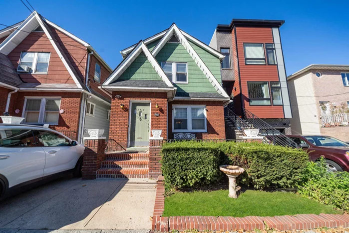 Discover this charming one-family home with parking and set on a spacious 28' x 100' lot. With three cozy bedrooms and one and a half baths, this residence also features a full unfinished basement and a generous yard, perfect for outdoor gatherings. Nestled in the vibrant Jersey City Heights neighborhood, 263 Columbia Ave is brimming with potential, though it does require some tender loving care. You'll appreciate the lovely details throughout, including beautiful hardwood floors with inlay, original moldings, and a welcoming front porch. This home is an ideal canvas for buyers eager to infuse their personal style or a fantastic opportunity for investors and developers looking for a prime-sized lot. The property is being sold as-is. Conveniently located near NYC transportation, parks, restaurants, and shops, this home offers a lifestyle of ease and accessibility. Don't miss your chance to explore 263 Columbia Avecall today for your personal tour!