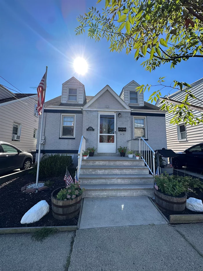 Welcome to your cozy cape, complete with updated kitchen, fenced in backyard with gazebo, 3 bedrooms, 3 full baths, finished basement with summer kitchen,  amazing location close to shopping, parks, and NYC transportation