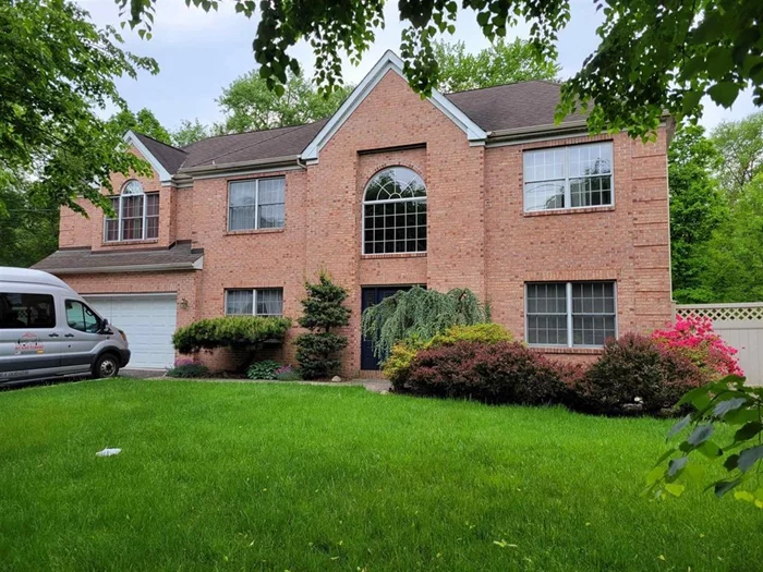 Fabulous 5 Br, 3 Bth, Center hall, Colonial in Paramus, Modern + Spacious layout, built in 2002. 2675 sqft of Living space, Formal Living + Dining, Open Kitchen with 2nd Dining area, Family room with fire place , Master Br with private Bth, Central A/C, 2 Car garage, 2 Side yards + Backyard. 163-203 lot, the backyard has a private trail with a forest like setting that is part of the property. The trail leads to a public park with a lake. Come see this gem, call today!