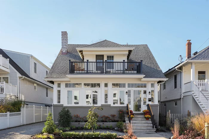 Charming Restored Home with Stunning Water Views at the Jersey Shore..... Welcome to this beautifully restored coastal gem, where exceptional design and craftsmanship meet the serene beauty of the Jersey Shore. Situated just steps from the shimmering shores, this home boasts breathtaking water views that will leave you mesmerized from sunrise to sunset. Set on a beautifully manicured lawn with lush landscaping, this home exudes curb appeal from the moment you arrive. Step onto the enclosed front porch an ideal space to unwind and enjoy the tranquil surroundings. Inside, the home has been thoughtfully renovated to preserve its timeless character while incorporating modern finishes. This property features spacious living areas with an abundance of natural light. The open-concept floor plan flows seamlessly, perfect for both everyday living and entertaining. Gorgeous hardwood floors, classic architectural details, and large windows that frame the stunning water vistas provide a sense of tranquility and elegance throughout. The gourmet kitchen is a chef's dream, featuring a large island surrounded by custom cabinetry, high-end appliances, and stylish finishes. This space opens to a spacious dining area, perfect for family gatherings or intimate meals. Beyond the dining area, the living room exudes comfort and style, with a striking stone wood-burning fireplace as its centerpiece. The natural stonework adds a rustic touch, perfectly complementing the home's sleek, modern design. Expansive windows flood the room with light, highlighting the warmth of the fireplace and offering stunning views of the water and landscape. Step outside into your private outdoor oasis, designed for relaxation and reflection. With beautiful pavers and thoughtfully arranged landscaping, this tranquil retreat offers the ideal space to unwind, entertain, or simply enjoy the gentle sound of the waves and the peaceful surroundings. Whether you're hosting friends or enjoying a quiet moment, the outdoor space provides an everyday sanctuary. The home offers multiple bedrooms and luxurious bathrooms, including a master suite with a private balcony overlooking the water perfect for feeling like you're on vacation every day. The meticulous attention to detail in every room ensures comfort and style at every turn. Located in a highly sought-after area, this property offers the perfect balance of seclusion and convenience. Just moments from top-tier dining, shopping, and entertainment, yet tucked away to offer a peaceful retreat. Whether you're looking for a year-round residence or a summer getaway, this property offers the best of both worlds. Come experience the magic of coastal living schedule your private tour today!