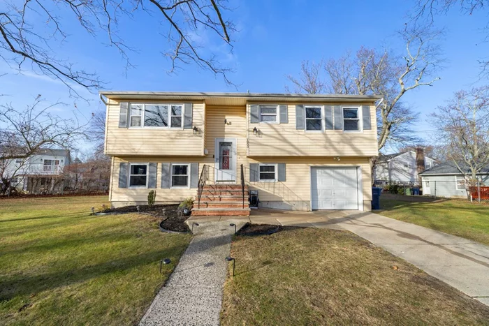 A Christmas surprise awaits in lovely Brockton Estates. This sunny Bi-Level is perched on a wide open, south facing lot, making for a very happy home. Complete with trees and a huge yard, it is great for children to run and play. This home has 4 bedrooms upstairs, a big living room with the S/SW facing bay window, & a FDR. Downstairs has a 4th BR,  family room, laundry room, 1/2 bath, attached garage. Plus a big family room w/sliding glass doors to the patio. Outside has a big patio w/grilling area that gets the evening sunlight = perfect for BBQ's and eating dinner outside. Home has hardwood floors, Rheem water heater, and oil heat.  One abandoned tank underground + a new above ground tank.  Quiet street in a non through fare neighborhood located by the new Aldi shopping center.