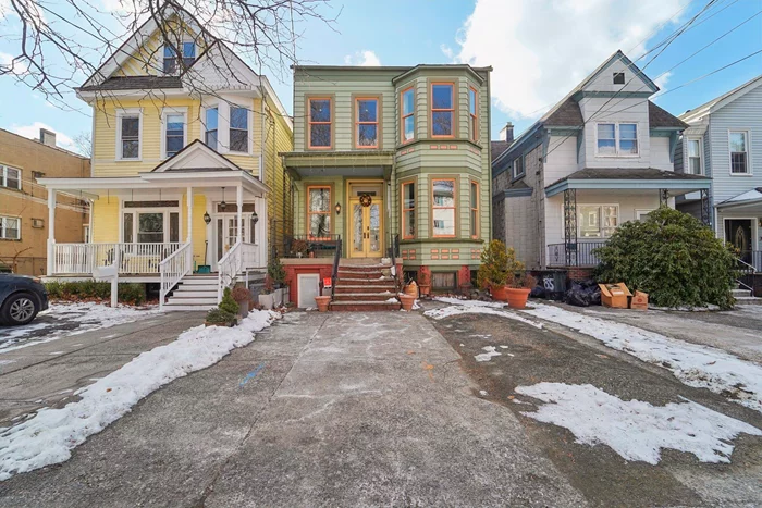 Queen Anne Victorian on quiet, tree-lined Sherman Place. 4/5 BRs, 2.5 BATHS, 2- car parking and 140-ft, park-like backyard. Welcome home to this historic residence w/ original details throughout, including 10- and 11-ft ceilings, parquet floors, crown moldings and trim, pocket shutters and doors. This 2850 sq. ft. home offers plenty of space and custom Marvin windows allow plenty of sunlight. There's more than enough room for family and friends to enjoy the open, formal DR and gourmet EIK that opens to deck overlooking your private, fenced-in, 3500 sq. ft. backyard. This spacious parlor floor level, where rooms flow seamlessly into each other, includes a grand living room, entry room, and half BATH in addition to LR/DR. From there you ascend a unique, airy, semi-circular staircase under a stained-glass skylight to the spacious, sun-drenched bedroom level that includes 3 large BRs, home office (possible 4th BR) w/built-in bookshelves, full BATH, and closet access to the attic for additional storage. The fully finished garden level, a few steps down from the street, features guest/in-law suite comforts like large BR w/3 closets, spa-like full BATH, open living/entertainment areas with additional storage, kitchenette, laundry, and access to backyard and driveway. Sherman Place is perfectly located a mile from Journal Square, under 2 miles from Hoboken Terminal, 5 miles from the Holland and Lincoln Tunnels, and only 2 blocks from Pershing Fields Park &amp; Recreation Center, the Reservoir, Leonard Gordon Park, Central Avenue stores, and NYC buses.