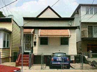 BEAUTIFUL ONE FAIMLY, MINT CONDITION, HARDWOOD FLOOR, BONUS APARTMENT WITH FULL BATH, ONE CAR PARKING, CUSTOMIZED BUILD KITCHEN, MODERN BATHROOM WITH JACUZZI TUB, 4 YEAR OLD RUBBERIZED ROOFING, QUIET NEIGHBORHOOD OF WEST BERGEN.