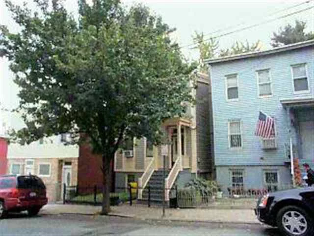 VERY NICE HOME 2 APTS. DOWNSTAIRS IS A 1 BR, 1 BTH APT. GOOD SIZE ROOMS. UPSTAIRS APT IS A DUPLEX W 3 BR. 1 BTH. NICE OPEN LAYOUT. DECK OFF KIT. MOVE IN CONDITION. STEPS TO NEW CONGRESS ST LITE RAIL AND NJ TRANSIT. 2 FIREPLACE, TILED KIT, 3 BTHS, HW FLOORS. A MUST SEE.