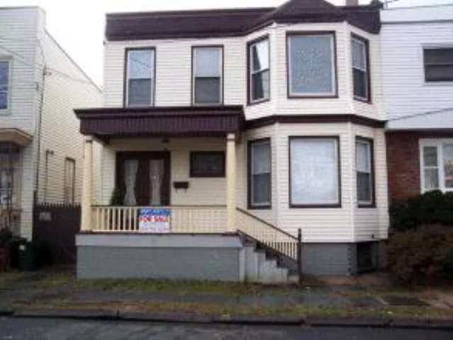 5 BEDROOMS, 2 FULL BATHS, SKYLIGHT IN BATHROOM, STAINED GLASS, CENTRAL AC 2 FIREPLACE MANTLES, LARGE BACKYARD. CLOSE TO NYC TRANSP. MAKE AN OFFER. ANXIOUS TO SELL.