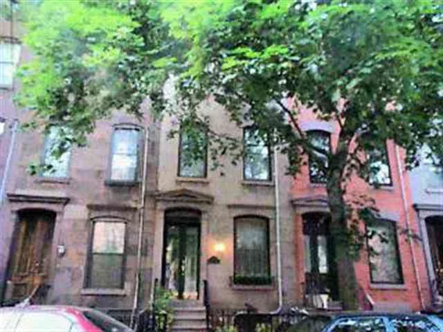 EXQUISITE UPTOWN BROWNSTONE ON PREMIER HOBOKEN BLOCK, FORMAL LIVING ROOM W GAS FIREPLACE, EXPOSED BRICK, DINING ROOM. EAT IN GRANITE KITCHEN. NEWLY LANDSCAPED YARD W PAVERS AND DECK. MEDIA ROOM DEN W OVERHEAD PROJECTOR AND SURROUND. MASTER SUITE W SKYLIGHTS, GRANITE MARBLE BATH W SEPERATE SHOWER AND JACUZZI. FULLY FINISHED BASEMENT W NEW ITALIAN TILED BATH. ABSOLUTELY GORGEOUS.