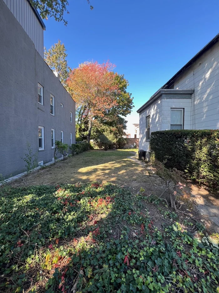 Welcome to this unique opportunity in the heart of Jersey City Heights! This one-family home sits on a generous 30x100 lot, complemented by an additional 20x100 lot, offering endless possibilities for your dream renovation or expansion. Featuring solid bones, this home is brimming with potential. With spacious rooms, high ceilings, original tin ceilings, beautiful molding, stained glass, and abundant natural light, the layout awaits your own creative imagination. Picture your ideal open-concept kitchen and cozy living spaces or restore the original character of this gracious grand dame to glory, with your own personal touch! The exterior boasts a lovely large yard, perfect for outdoor entertaining, gardening, or simply relaxing. Elevated high off street level, it affords ultimate privacy and seclusion. The two lots provide a unique space in an urban environment. Located in a vibrant family friendly neighborhood with great neighbors, you're just steps away from Washington park, local shops, and dining options. Walking distance to public transportation (Light Rail and buses), commuting to Manhattan and other areas is a breeze. Bring your vision and creativity to this promising property and turn it into the home of your dreams! Property must be sold with 367 Webster Ave- 30x100 adjacent one family home (MLS # 240021679).