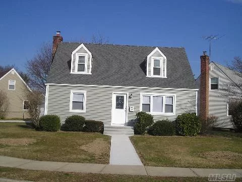 Beautiful Cape With 4 Brs, 2 New Baths, New Eik, Hardwood Floors Through Out, New Appliances, Everything New..Must See