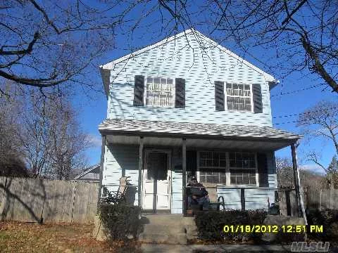 Excellent Opportunity In Excellent Neighborhood & School District. Nestled On An Oversized 80X100 Property, This Colonial Features Pergo Floors, 3Bdrm, 1 1/2 Baths & Full Basement. All Offers Subject To 3rd Party Bank Approval For Short Sale. No Car Needed To Roslyn Lirr Station. Present Highest & Best Offers W/ Credit, Pre-Approval & Income. Owner Motivated.