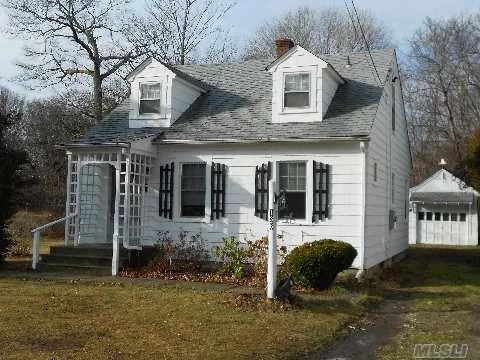 Country Cape Has 2nd Floor Suite With Br, Full Bath And Sitting Room/Den Situated On Large Property. Exterior Painted Last Summer, Archetectural Roof 5 Yrs, Gas Burner & Water Heater 1 Yr., Well Built Home Close To Patchogue Main Street Stores, Restaurants, Theatre, Waterfront And Lirr. This Home Has Terrific Potential. Photos Updated.