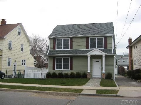 Newly Renovated From Top To Bottom, Inside And Out. Large Living Room And Dining Room. Brand New Hardwood And Tile Fllors, Granite And Stainless In Kitchen. Full Finished Basement, French Doors Lead To Outside Access. Beautiful Yard And Lawn Sprinkler. Lots Of Closet Storage. Close To Schools, Beaches And Shopping.