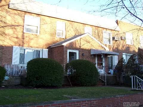 Welcome To This Attached Colonial House.