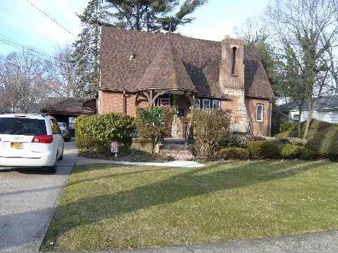 Charm And Style Abound In This Gingerbread Tudor. Spacious Lr W Fpl Has Lrg Sunny Windows, Built In Window Chest Seat& Cathedral Ceiling. Wood Fls Thru Out Home.Huge Formal Dr, Eik, 3 Lovely Brs, 2 Bths, Andersen Windows, New Roof Sept&rsquo;11, 5Yr Oil Burner+Hw Heater.Full Bsmt, 1 1/2 Car Gar. Close To Lirr, 6 Miles To Beaches.Picturesque Development Setting W Curbs & Sidewalks.