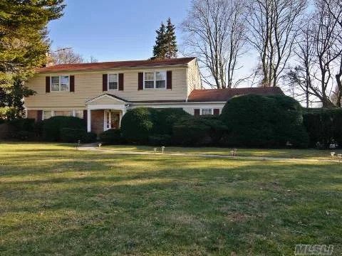 Location! Location! Traditional 5 Bedroom 3.5 Bath Colonial Perfectly Sited On Desired Cul-De-Sac. Tranquil Flat 2.31 Acres With Fresh Water Pool.