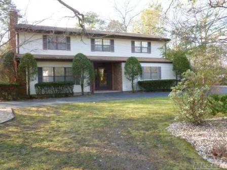 Immaculate Colonial In Desirable West Bay Shore Offers 5 Bedrooms, 2.5 Full Baths, Formal Living Room, Formal Dining Room, Den, Solarium With Sauna, Workout Room, Master Bedroom With Dressing Area And 2 Walk-In Closets, New Roof, And New Furnace.