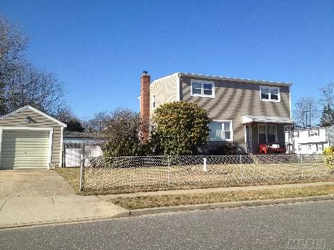 New Vinyls Siding. All Large Rooms, Great Block. Fully Dormered . Finished Basement.