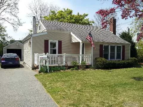 Mint Home Close To Village. This Charming Home Features Many Updates Including Kitchen, Siding, Roof, Windows, Bath, Deck & More. Master Bath Features Walk In Closet & Full Bath W/Stall Shower. Stairway Leads To Lge Partly Finished Attic. Great Location & Taxes W/Star $7544.75.