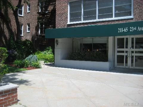 Oversized & Sunfilled 950 Sq. Ft One Bedroom In Bell Apartments-indoor Garage Ownership Included In Sale- C/A/C, Top Location-express Bus To City Right Outside Your Door, Minutes To Lirr.