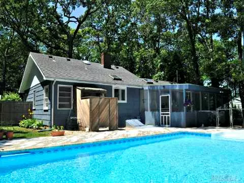 Quintessential Three Bedroom North Fork Beach Cottage With A Beautiful 20X40 Heated In-Ground Pool, Located On A Private Lane In The Heart Of Wine Country. This Vintage Gem Sits On A Quarter Acre With One Of The Best Sugar Sand Private Peconic Bay Beaches Just A Short Stroll Down The Road.