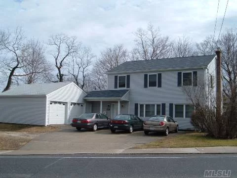 Legal 2 Family-6 Bedrooms 2 Car Garage Zoned C-2 With Additional Unfinished 1000 Square Ft Workshop. New Siding, New Roof, New Windows, New Boiler, New Electric, Port Jefferson Village Amenities.