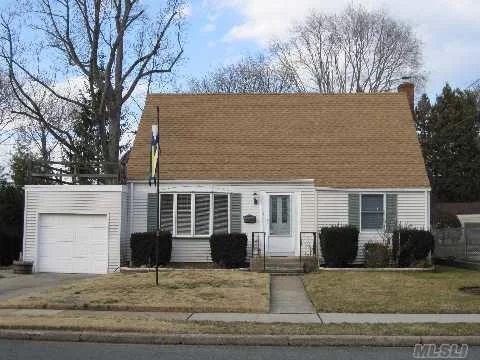 Expanded Colonial Cape. Bigger Than It Looks Outside. Lots Of Potential. House Being Sold In As Is Condition.