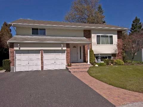 Beautifully Maintained Home In Syosset Sd. Spacious Entertaining Rooms, Cathedral Ceiling, Wonderful Family Room, Bright Sunny Kitchen, Hardwood Floors & Wonderful Deck. Lovely Front Walkway. Ideal For Parties. Great Yard With Lots Of Privacy. Convenient To Shopping, As Well As To Parkways.