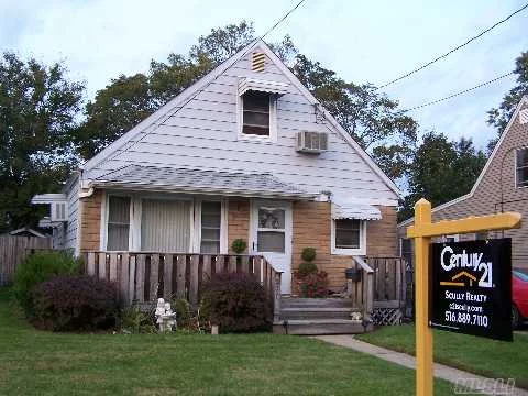 Adorable 4 Bedroom On Quiet Dead End Street. Updated Kitchen & Bath, Large Rear Deck, New Electric & Roof(7Yrs), Freshly Painted, Polished Hw Floors, Shed And Private Rear Yard.