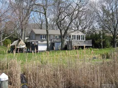 Beautifully Renovated Ranch On James Creek With Panoramic Vistas, Private Dock, Access To Peconic Bay And Deeded Beach Rights. The Perfect Summer Beach House Or Year Round Residence. Gourmet Kitchen, Updated Baths, Built-Ins In Office, Cvac, Cac. Ready To Move Right In And Enjoy...Don&rsquo;t Miss It!